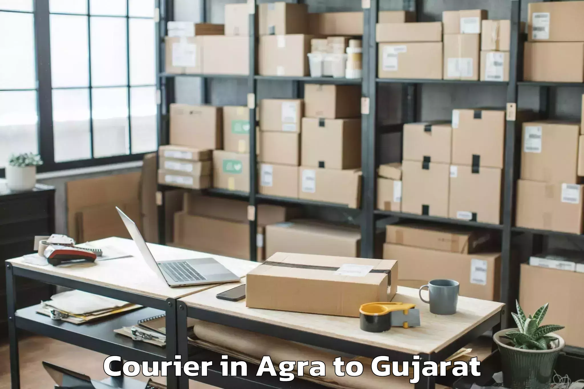 Discover Agra to Mangrol Courier